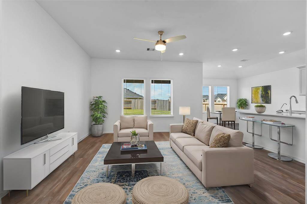 Amazing New Home on a Cul De Sac Lot! Covered patio! Sprinkler system! Stunning entry with high ceilings, carefree wood like vinyl plank flooring! Stunning open floor plan with the family area that flows into the casual dining and gourmet kitchen! Family area boast high ceilings, ceiling fan and a wall of windows looking out to your large private backyard. Gourmet Kitchen with beautiful tall shaker cabinets, quartz countertops and more! Virtual staged to show you how stunning this New Home can be!