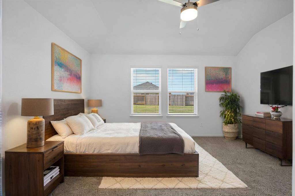 Wake up to peaceful backyard views in this stylish and well-lit primary suite, featuring ample space for furniture and decor.  Private primary suite tucked away for privacy!   **Photo is Virtually Staged to show how it would look like**
