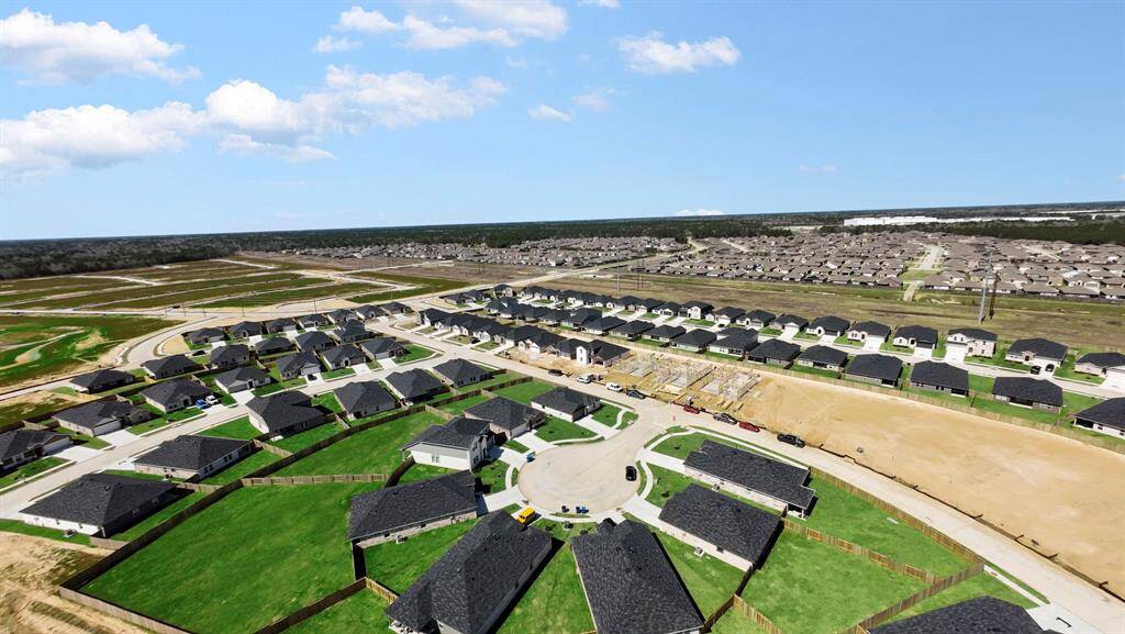 A stunning aerial view showcasing the well-designed neighborhood, offering a blend of nature and modern living.