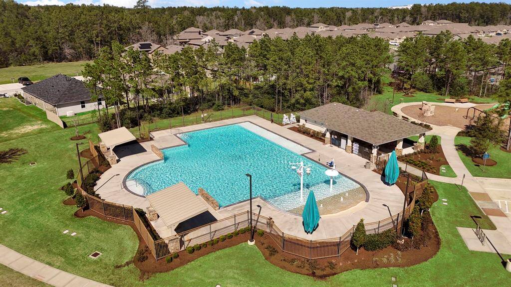 The community offers a sparkling pool with a splash area, making it perfect for families to enjoy fun in the sun.