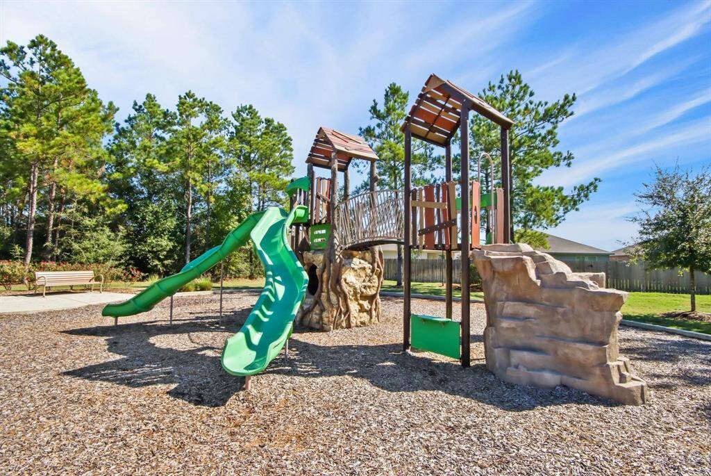 A fun and engaging play area with slides, climbing structures, and plenty of space for kids to explore and enjoy.