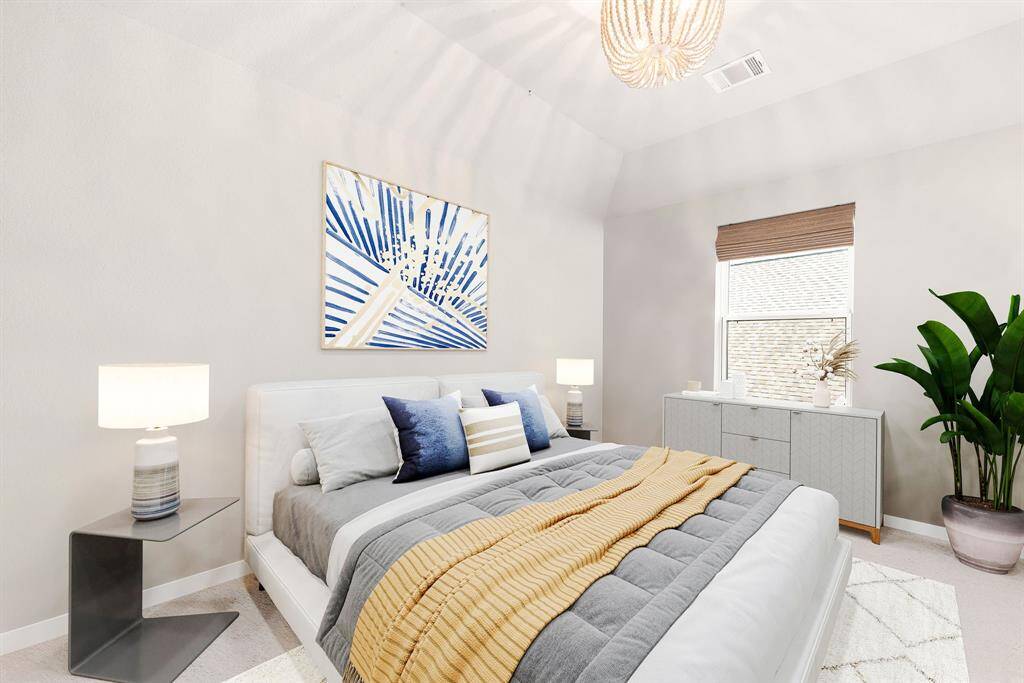 Secondary bedroom features plush carpet, custom paint, dark stained ceiling fan with lighting and a large window with privacy blinds. *Virtually Staged