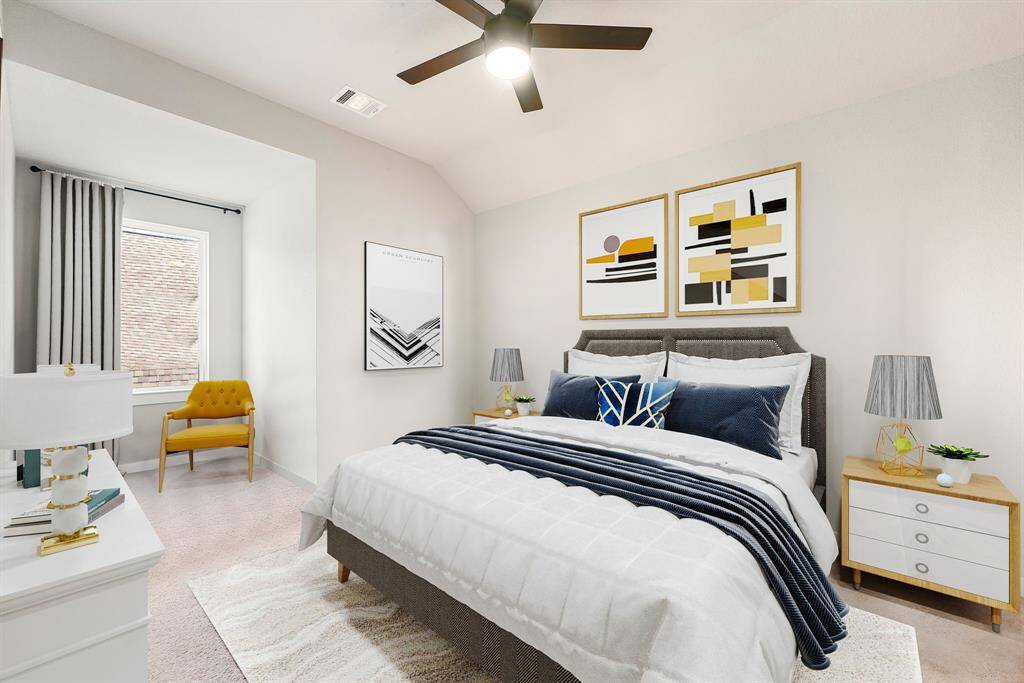 Secondary bedroom great for use as an in-law suite or guest suite features high ceilings, lovely modern ceiling fan, custom paint, plush carpet, space for seating area, direct access to the secondary bathroom and large window. *Virtually Staged