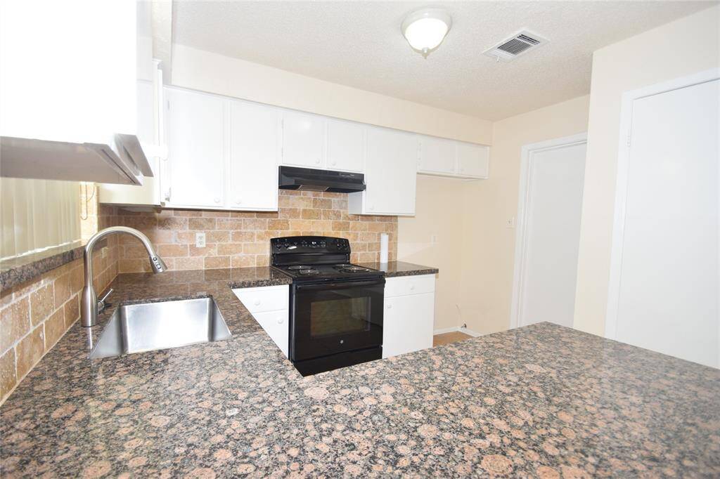 Enjoy another view of the kitchen.