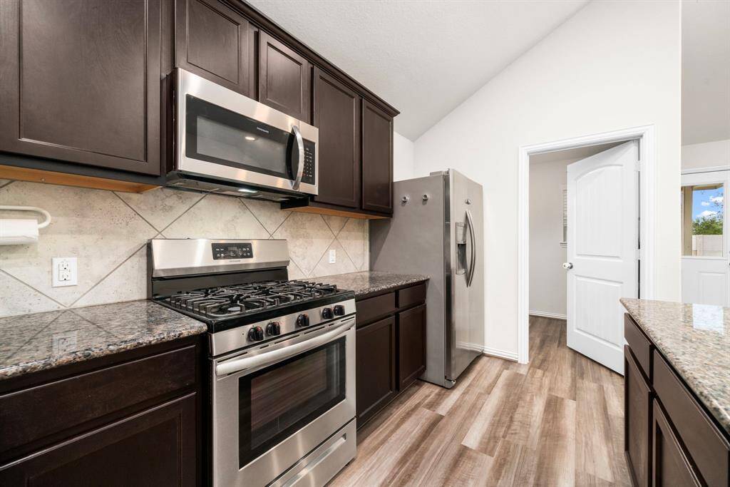 The chef in your household will enjoy gas cooking and stainless steel appliances.