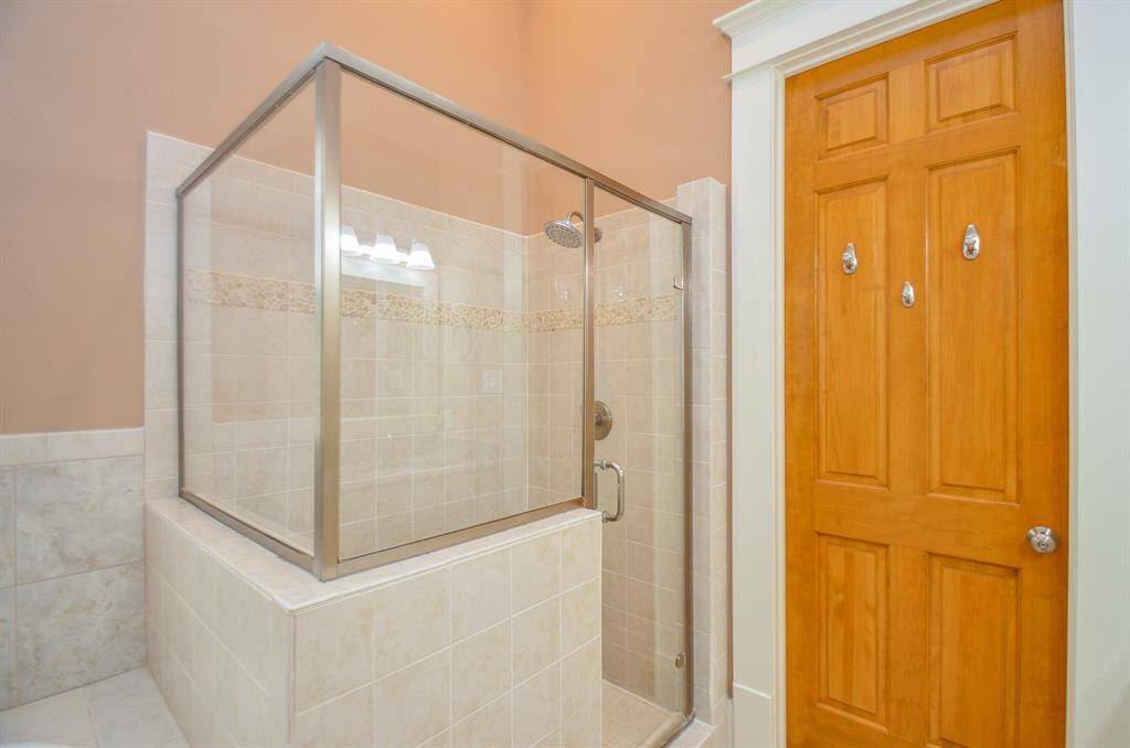 Principal bath separate shower.