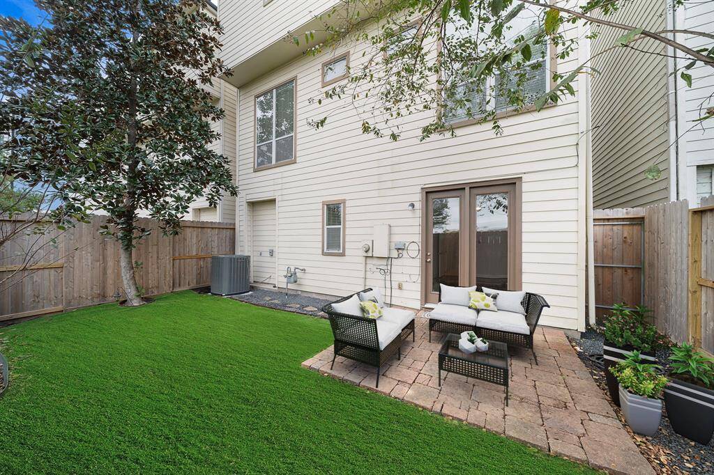 Spacious Outdoor Oasis with ArtificialGrass Splendor (staged)