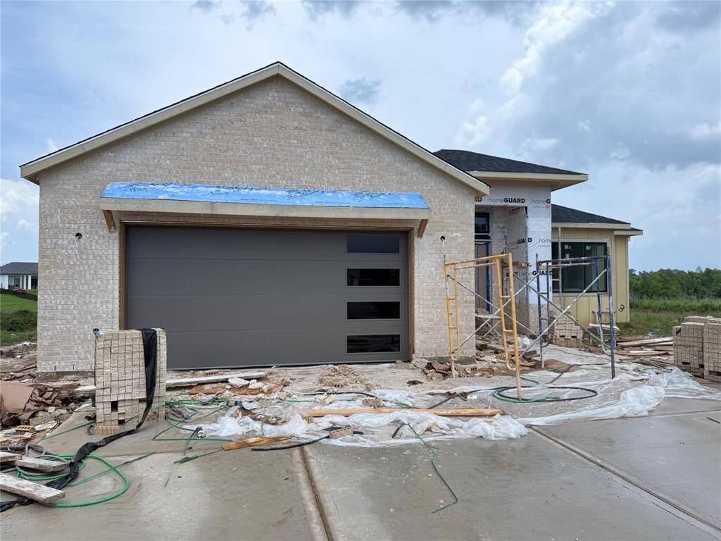 Progress! The brick will be painted white and the trim will be dark for a beautiful contrast!