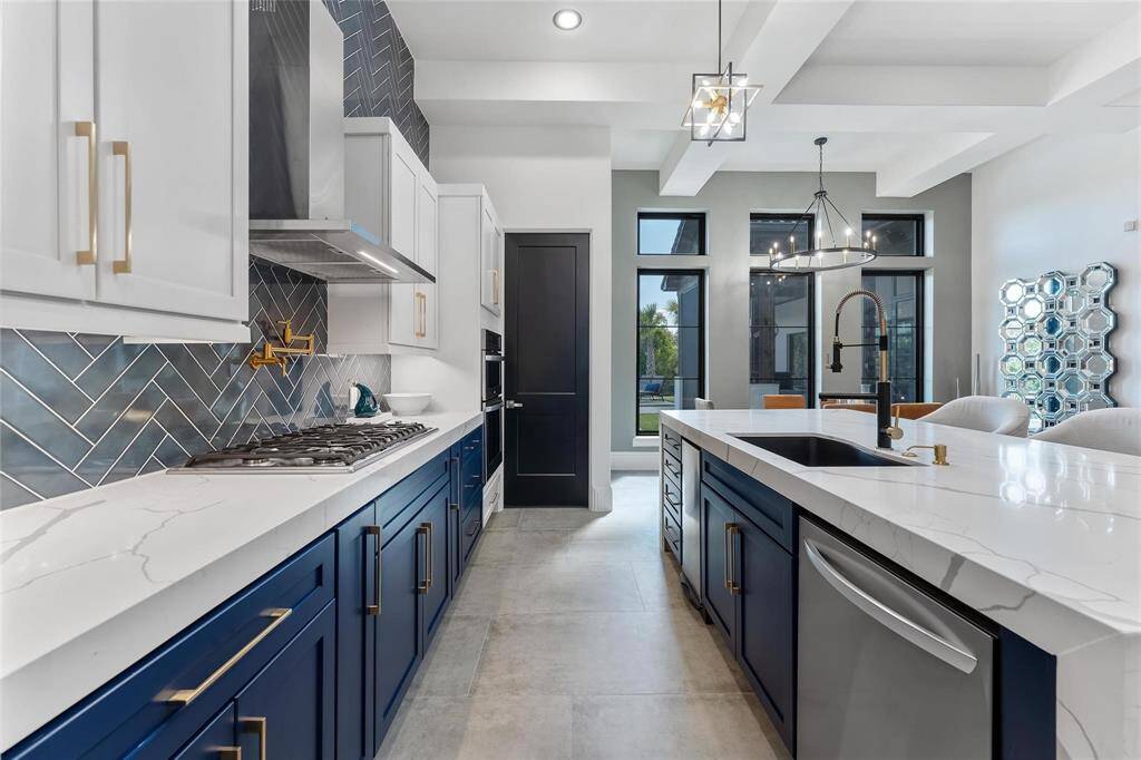 Model home Kitchen with island and professional grade appliances.