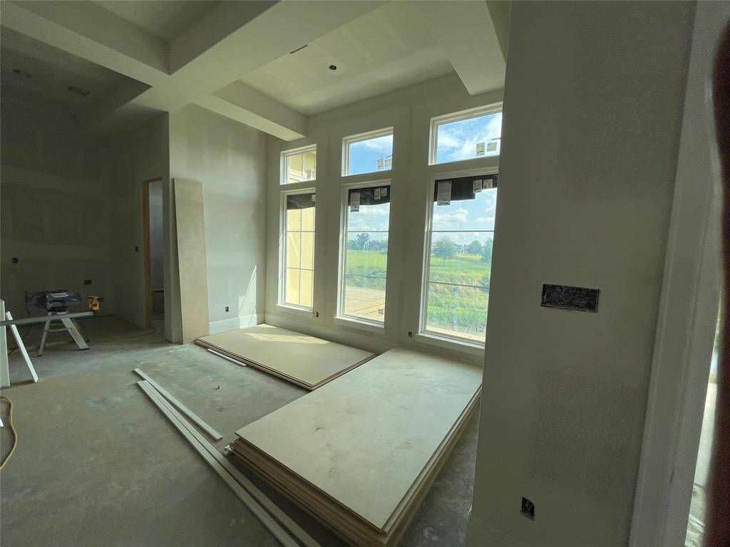 Current view of windows lining the back of the home!