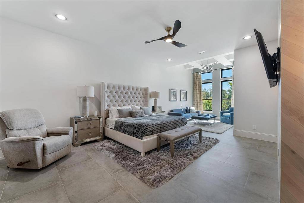 Model Home primary bedroom with sitting area!