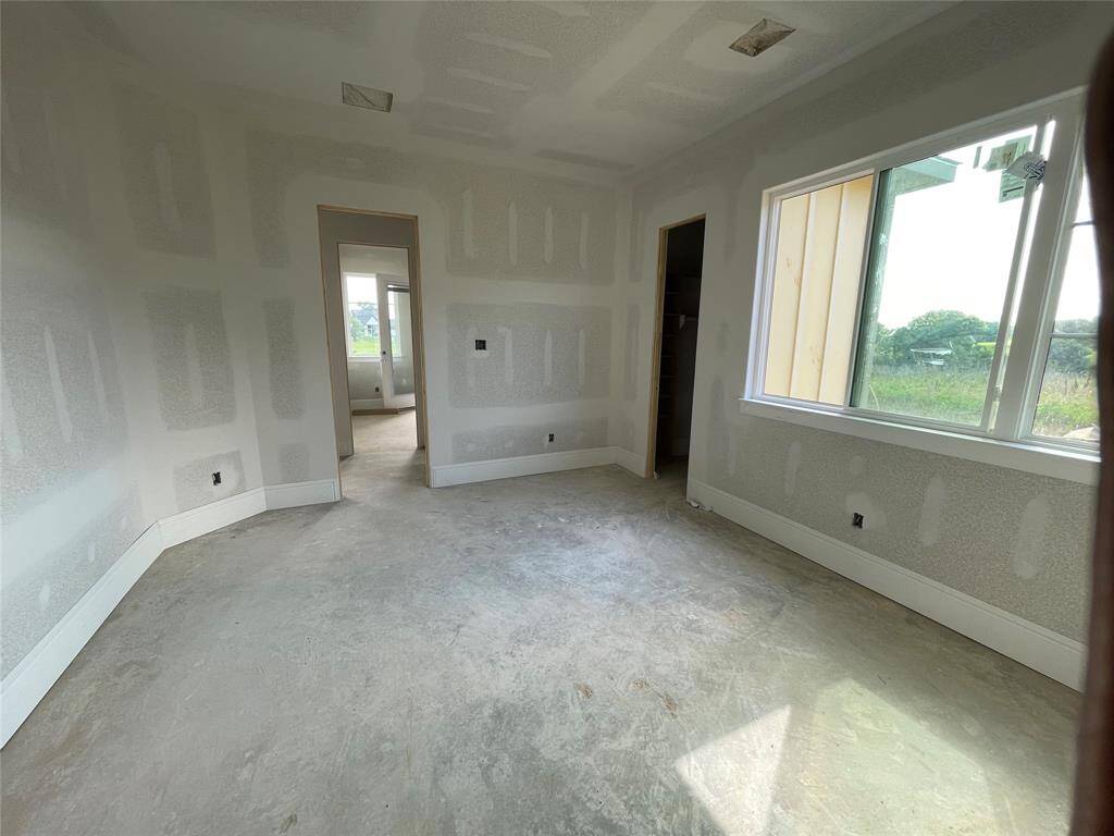 Secondary bedroom on right side of home