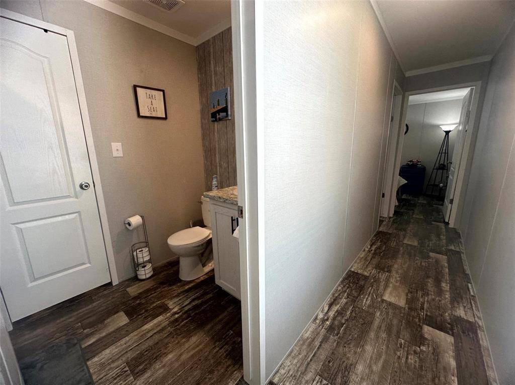 Heading down the hallway to the secondary bedrooms and bath