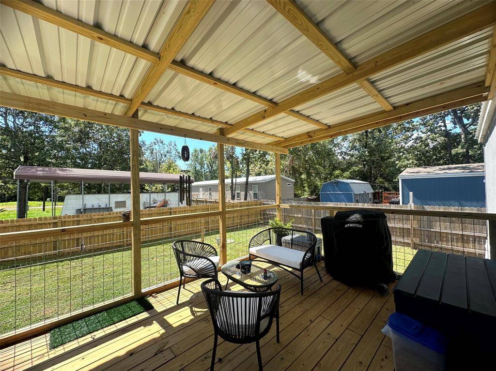 Your back patio is also covered and offers a great place to relax