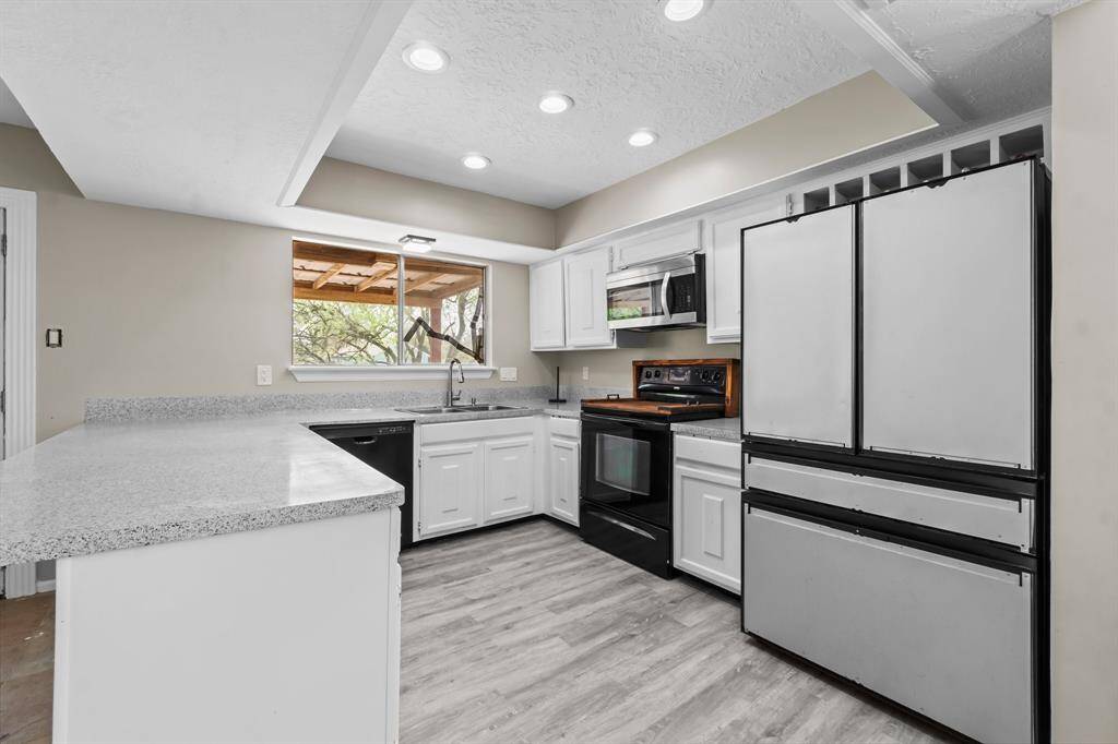 Upgraded Fridge stays! You can replace the front panels to match any color choice.
