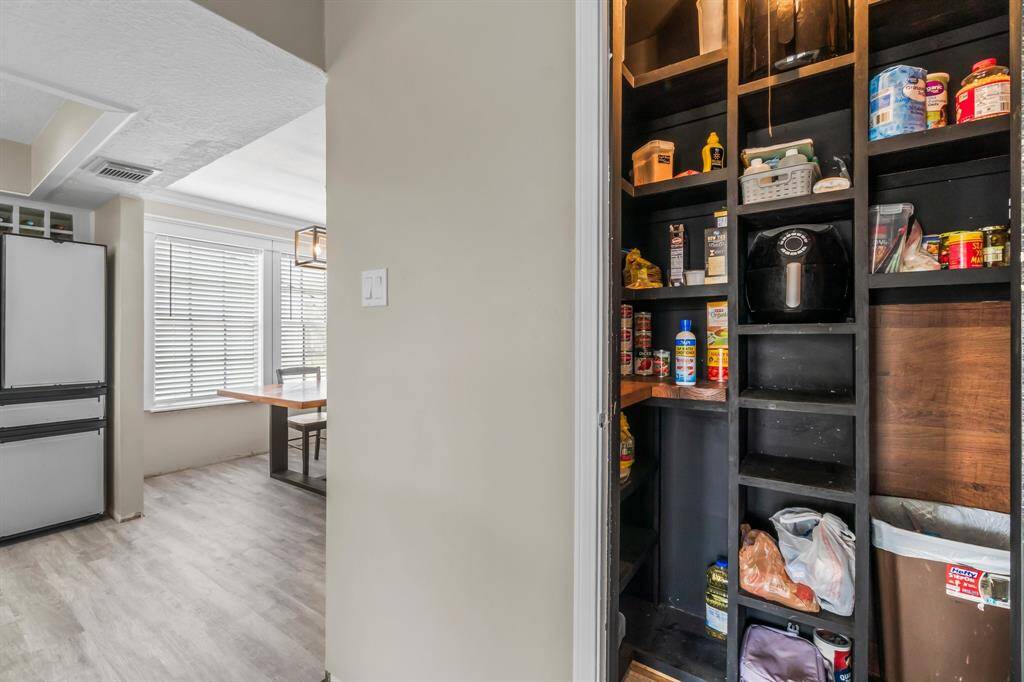 Custom built ins are found in the pantry.