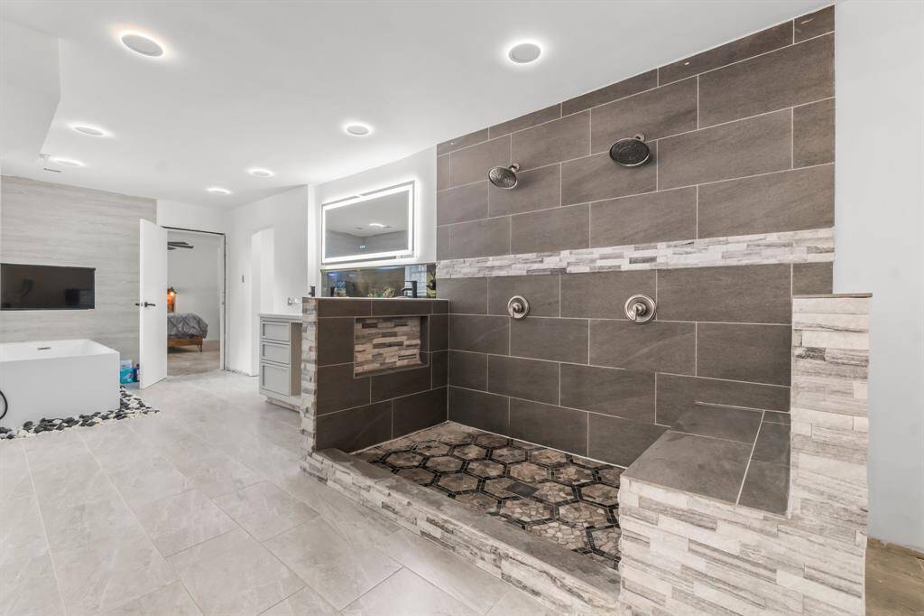 This open concept shower can be completed with a glass surround if desired.