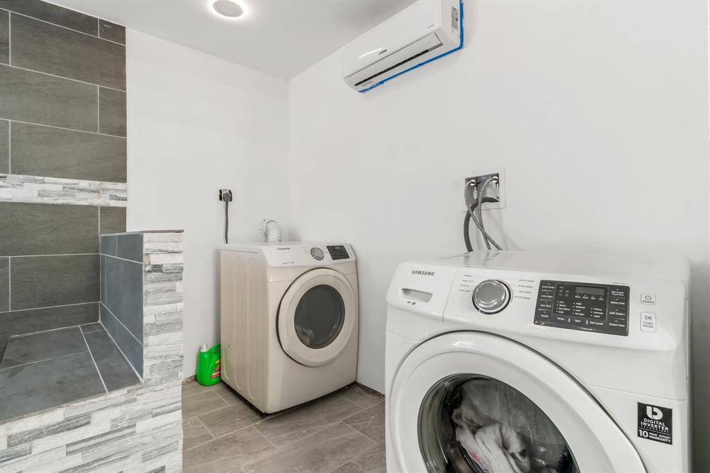 2nd utility room downstairs. The other utility is upstairs. WASHER AND DRYER STAYS!