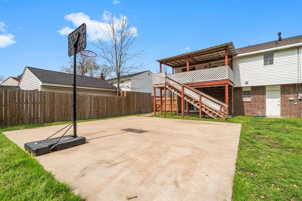 This large cement slab can be used to play basketball and offers a perfect spot for the kids or pets to play!