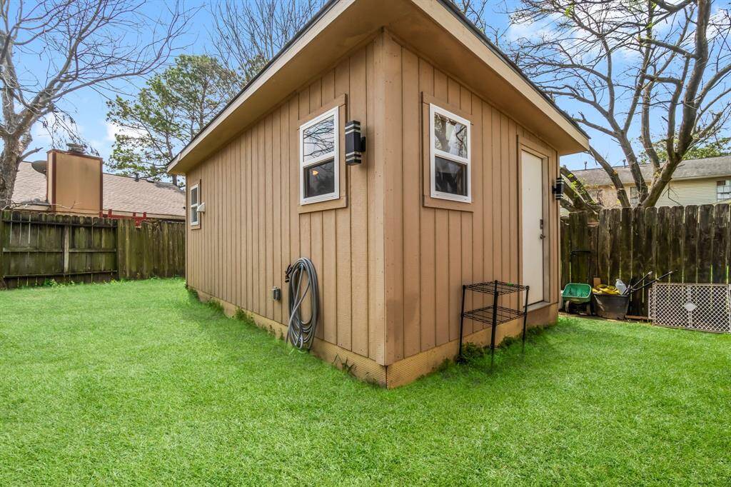 This apartment is surrounded by a privacy fence for extra privacy.