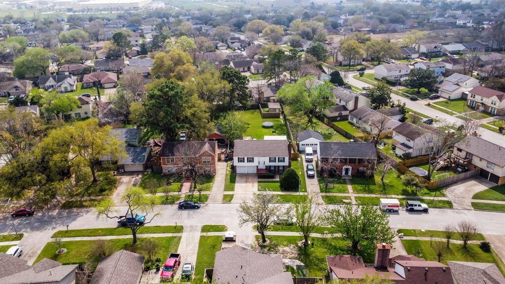 Aerial view of the surrounding neighborhood.