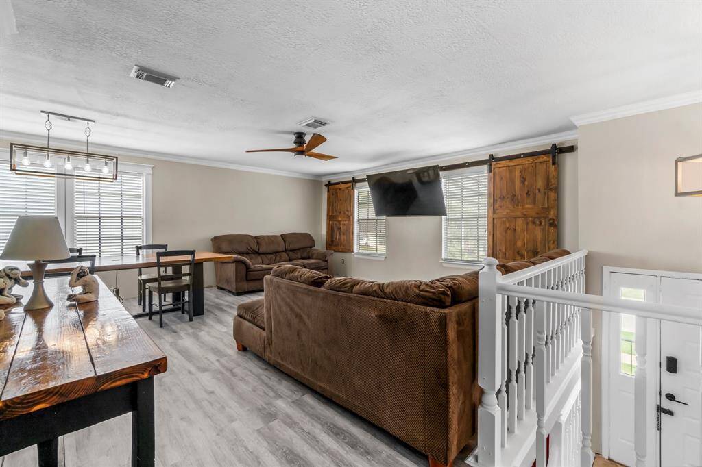Open living space offers several windows providing great natural light.