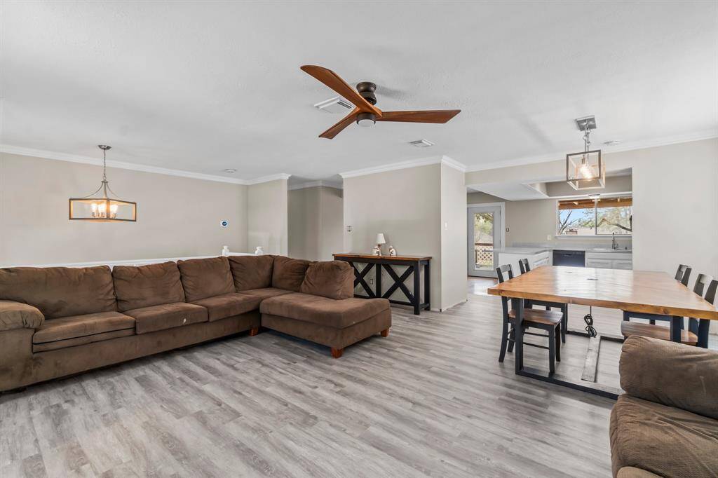 This living space is open to the kitchen and dining making entertaining a breeze.