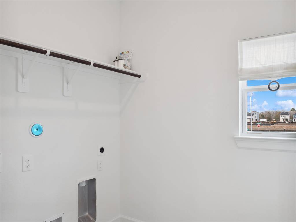 Laundry room (*Photo not of actual home and used for illustration purposes only.)