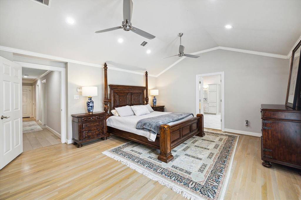 Speaking of gorgeous: At the rear of the home is this expanded, private and über luxurious Master Suite. With vaulted ceilings, hardwood floors and sweeping space this room is both functional and very romantic.
