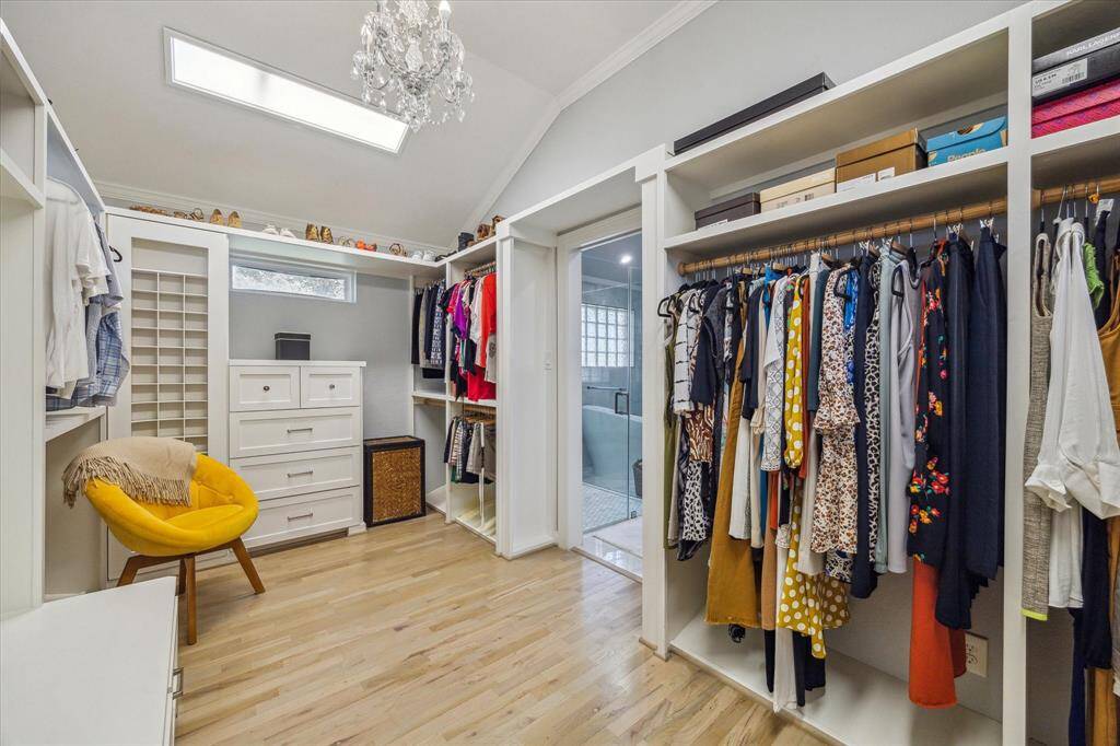 The brilliantly designed Closet has dual Dressers, niches for belts, ties, shoes, purses, a Mirror and hidden storage.