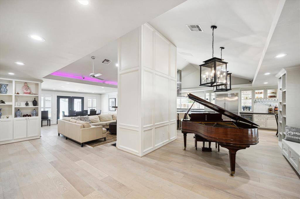 Hardwood floors run throughout the home. The Front Room could serve as a Dining Room, or a Sitting Room, or an ideal spot for your Baby Grand!