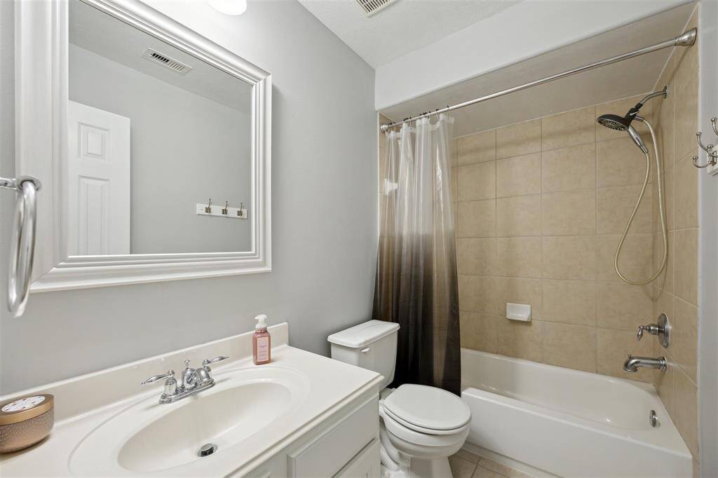 This is the full bathroom just across from the bedroom you just saw.