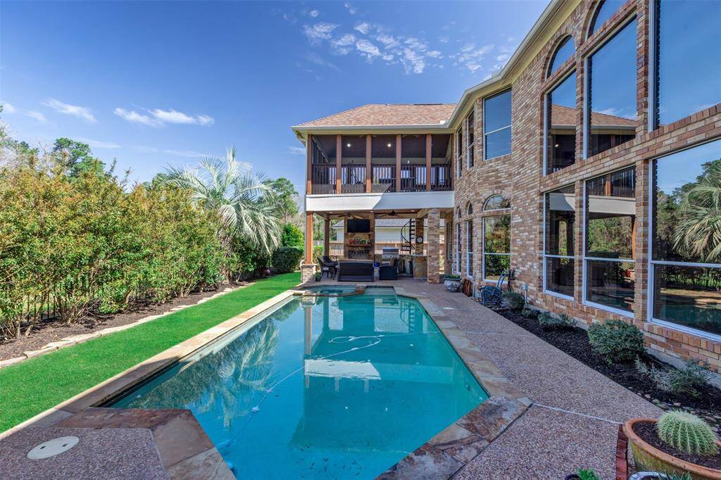 This beautiful two-story brick home with large windows, overlooking a spacious backyard featuring a pristine pool. The well-maintained landscaping includes lush greenery and backs to a permanent greenbelt, providing privacy and a serene atmosphere. Perfect for relaxation and outdoor entertaining!