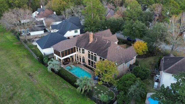 This setting for this gorgeous two-story brick home backing to a permanent greenbelt reserve offering privacy and with no neighbors behind. The outdoor space features sparkling pool/spa, lush landscapring and a covered outdoor living area with screened in covered porch on the second level, ideal for relaxation and entertaining.