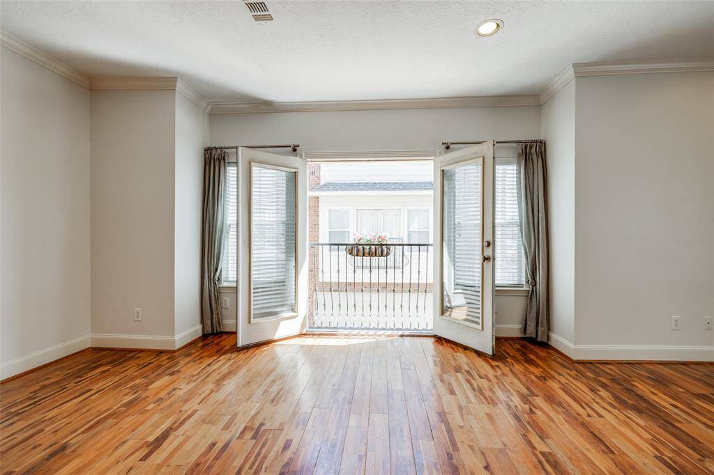 Living room and dining room has glass paneled French doors that open to a Juliet balcony. Great option to have on a nice day.