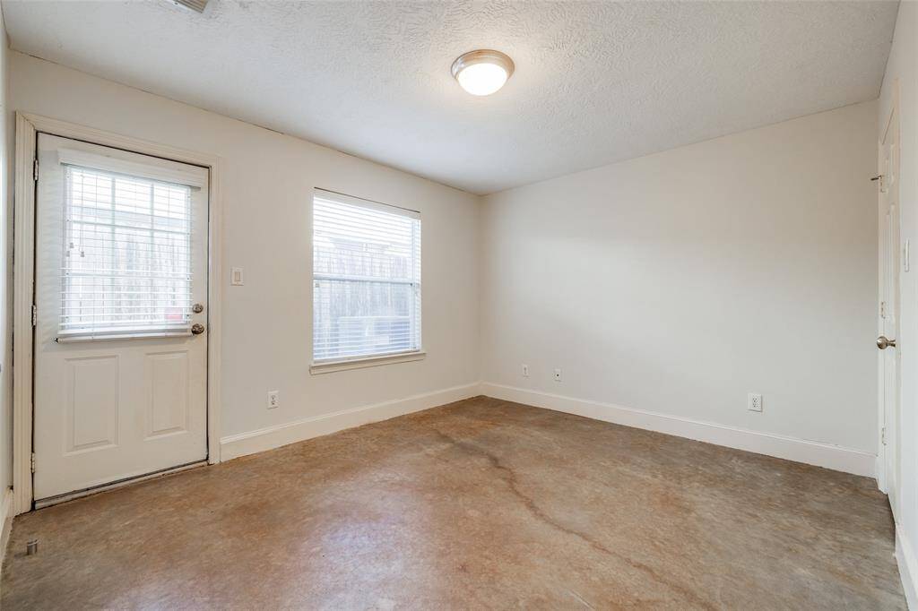 First floor bedroom has door to private backyard and a full bath.