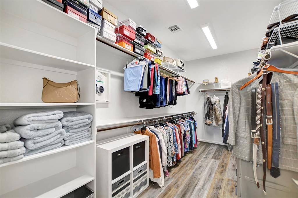 Huge primary closet with built in safe.