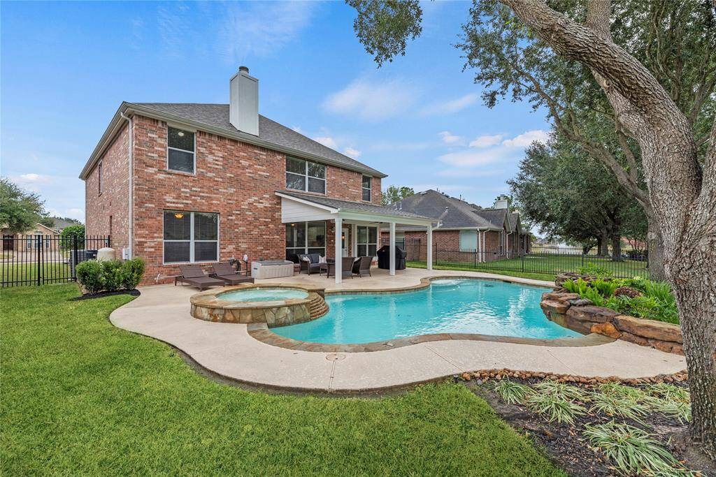 Private pool with large covered patio.
