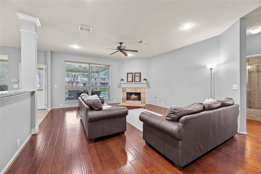 Spacious living area with a gas fireplace.
