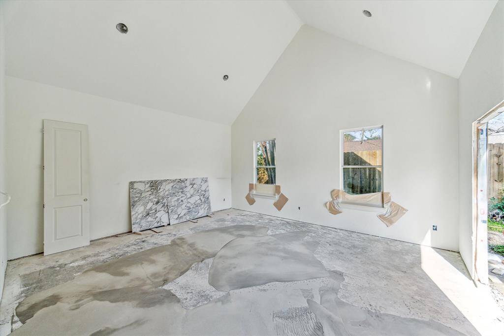 *construction as of March 2025* 18x16 primary bedroom with cathedral ceilings, european oak wood floors, private entry/exit to back patio, LED lighting. *see attachments for details of renovation*