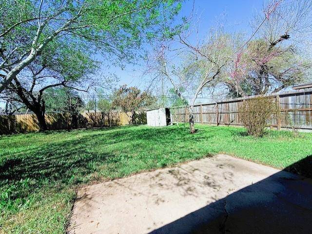 Large backyard with room to expand the patio.