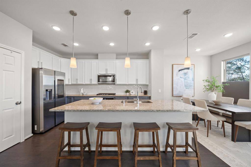 Oversized kitchen island provides a great casual seating option