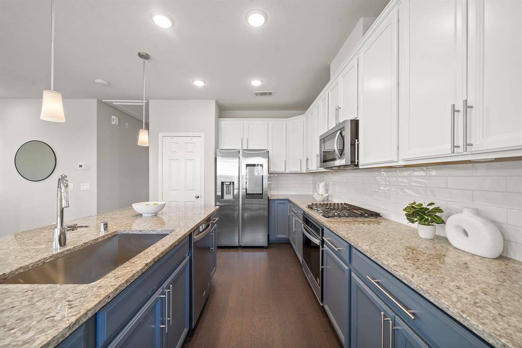 Plenty of cabinet space and a dedicated pantry!