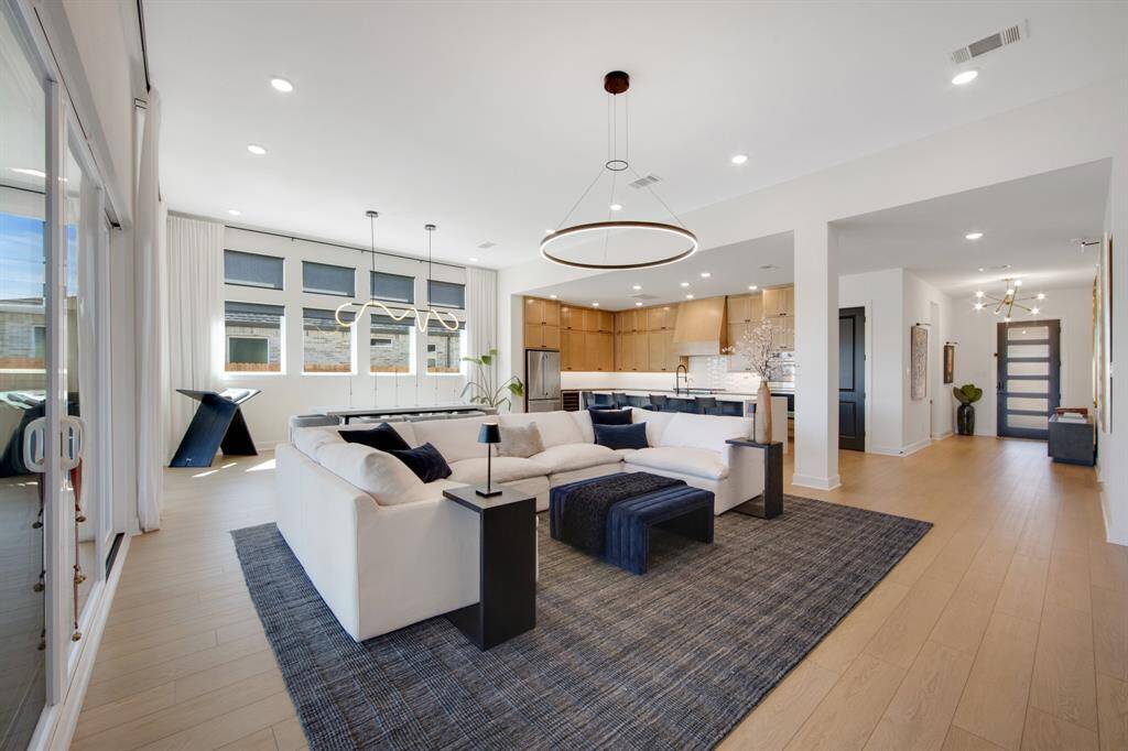 With its open floor plan, expansive outdoor access, and elegant design features, this home is truly an entertainer's dream, perfect for hosting gatherings and creating unforgettable memories.