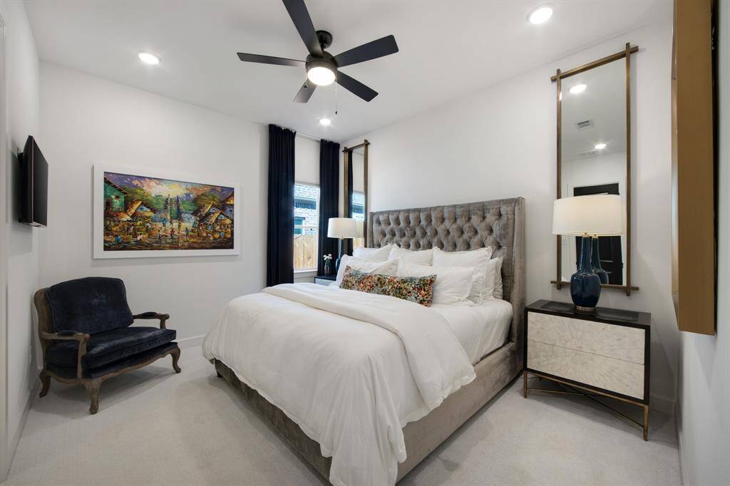 The guest bedroom offers ultimate comfort and privacy, complete with its own ensuite for a luxurious and convenient stay.