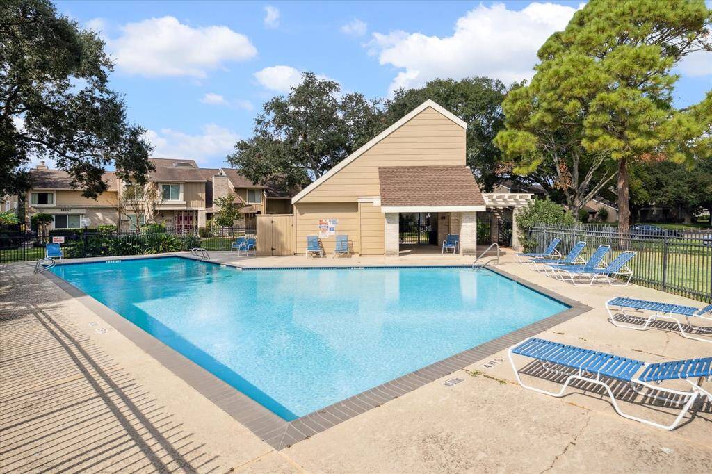 The home is in a prime location overlooking the community swimming pool area and adjacent clubhouse.