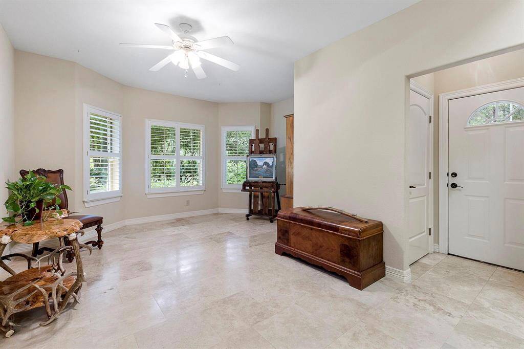 This second primary or guest suite offers a private living area. This combined suite area would be great for long term extended family or short term family/friend visits.