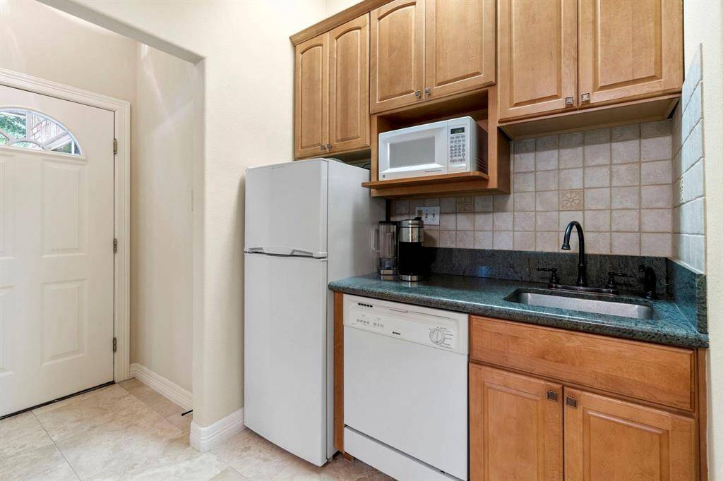 Everything you need for separate living from main living. Private entry/exit to driveway.