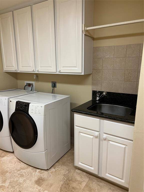 Utility/MUD Room with utility sink. This is a great place for a small pet bath wash.