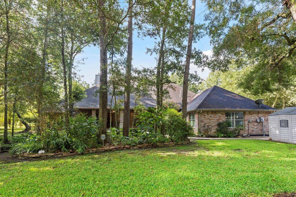 Landscaping / large trees in back.  Backs up to greenspace.